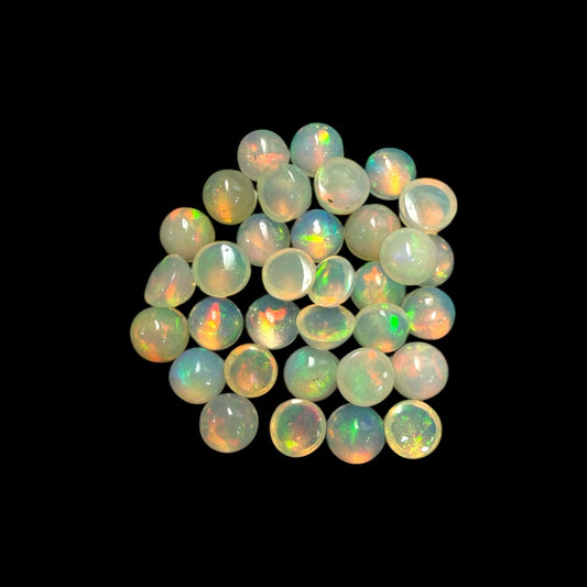 Natural White Ethiopian Opal Stone 21.58 Carats Round Cabochon Shape Size 6 mm
