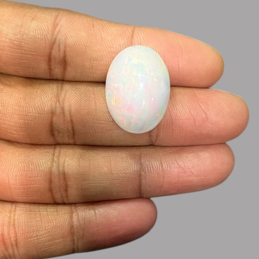 Natural Black Ethiopian Opal Stone 23.91 Carats Oval Cabochon Shape Size 23.9 x 17.6 x 10.4 mm