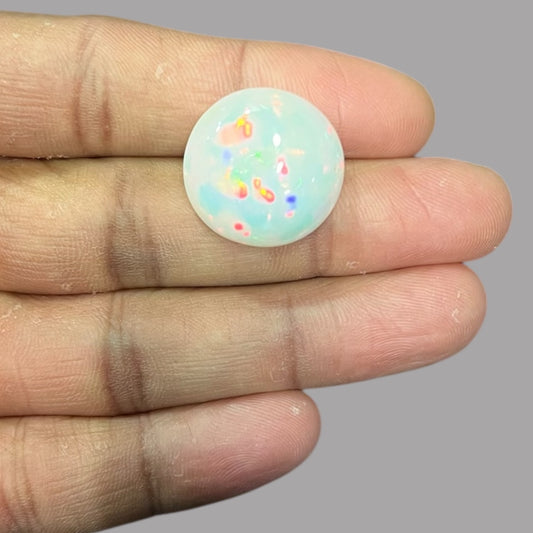 Natural Black Ethiopian Opal Stone 24.06 Carats Round Cabochon Shape Size 21.2 x 10.3 mm 