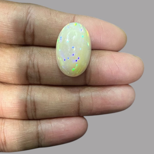 Natural Black Ethiopian Opal Stone 24.63 Carats Oval Cabochon Shape Size 24.6 x 16.5 x 11.5 mm
