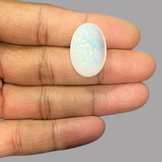 Natural Black Ethiopian Opal Stone 24.94 Carats Oval Cabochon Shape Size 24.4 x 16.5 x 12.1 mm