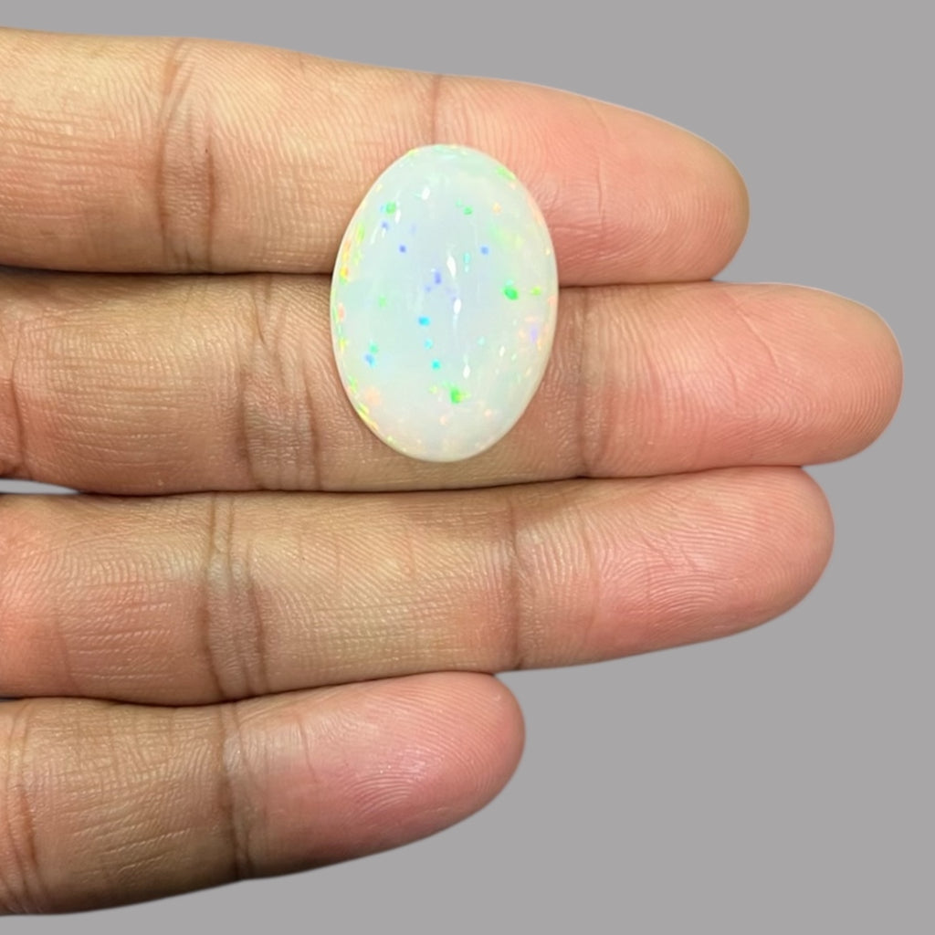Natural Black Ethiopian Opal Stone 26.10 Carats Oval Cabochon Shape Size 25.3 x 18.1 x 9.9 mm