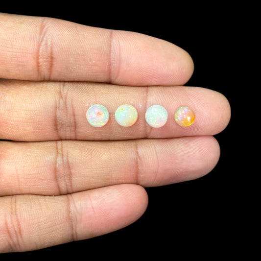 Natural White Ethiopian Opal Stone 26.17 Carats Round Cabochon Shape Size 7 mm