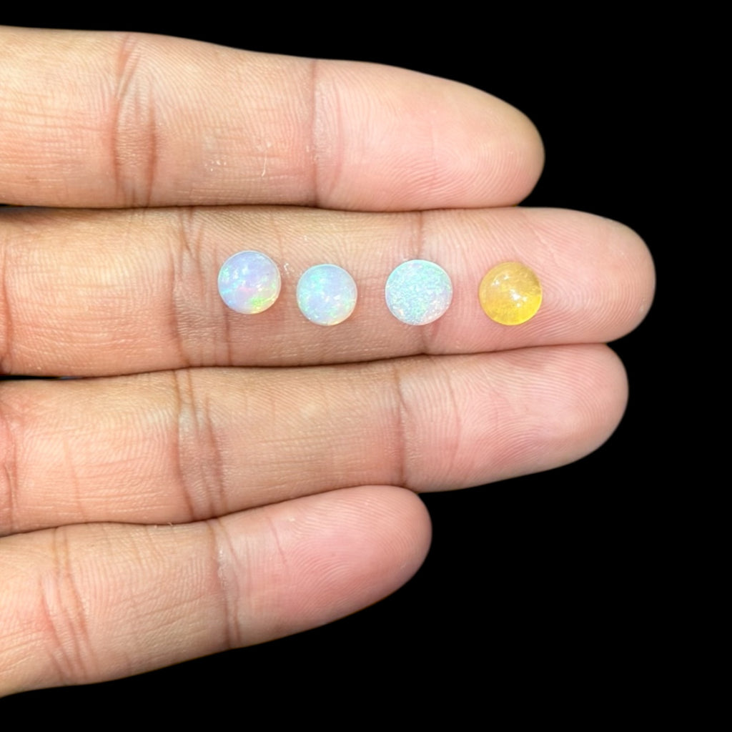 Natural White Ethiopian Opal Stone 26.91 Carats Round Cabochon Shape Size 7 mm