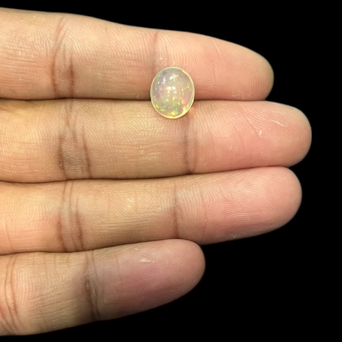 Natural Black Ethiopian Opal Stone 3.15 Carats Oval Cabochon Shape Size 11.2 x 9.7 x 6.1 mm
