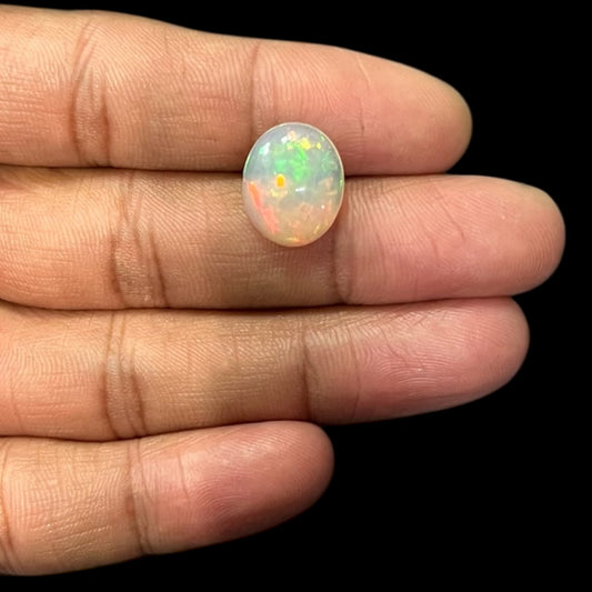 Natural Black Ethiopian Opal Stone 3.96 Carats Oval Cabochon Shape Size 15.2 x 12.5 x 4.8 mm