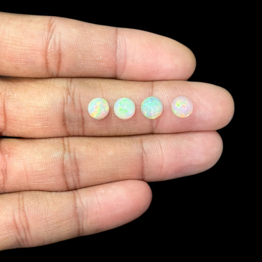 Natural White Ethiopian Opal Stone 33.44 Carats Round Cabochon Shape Size 7 mm