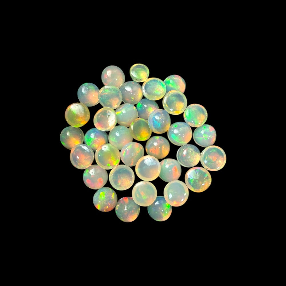Natural White Ethiopian Opal Stone 33.44 Carats Round Cabochon Shape Size 7 mm