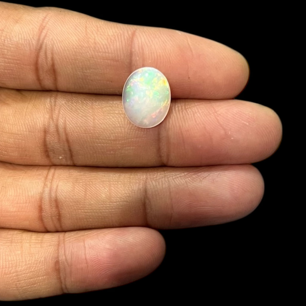 Natural Black Ethiopian Opal Stone 4.36 Carats Oval Cabochon Shape Size 14.2 x 11.4 x 5.5 mm