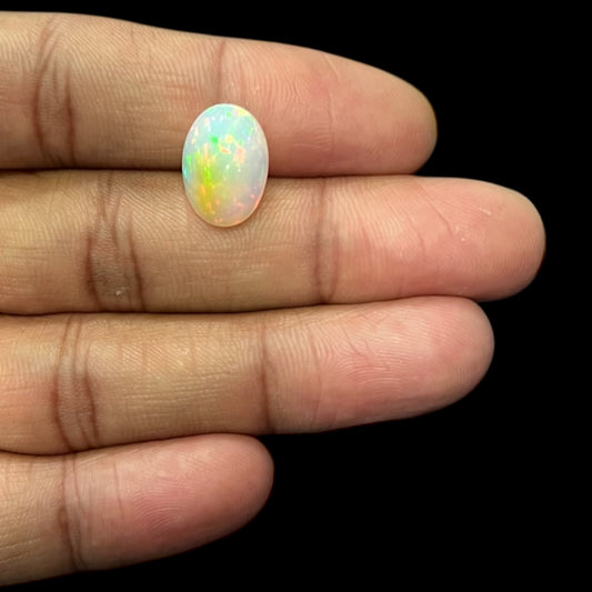 Natural Black Ethiopian Opal Stone 4.61 Carats Oval Cabochon Shape Size 14.7 x 10.5 x 6.2 mm