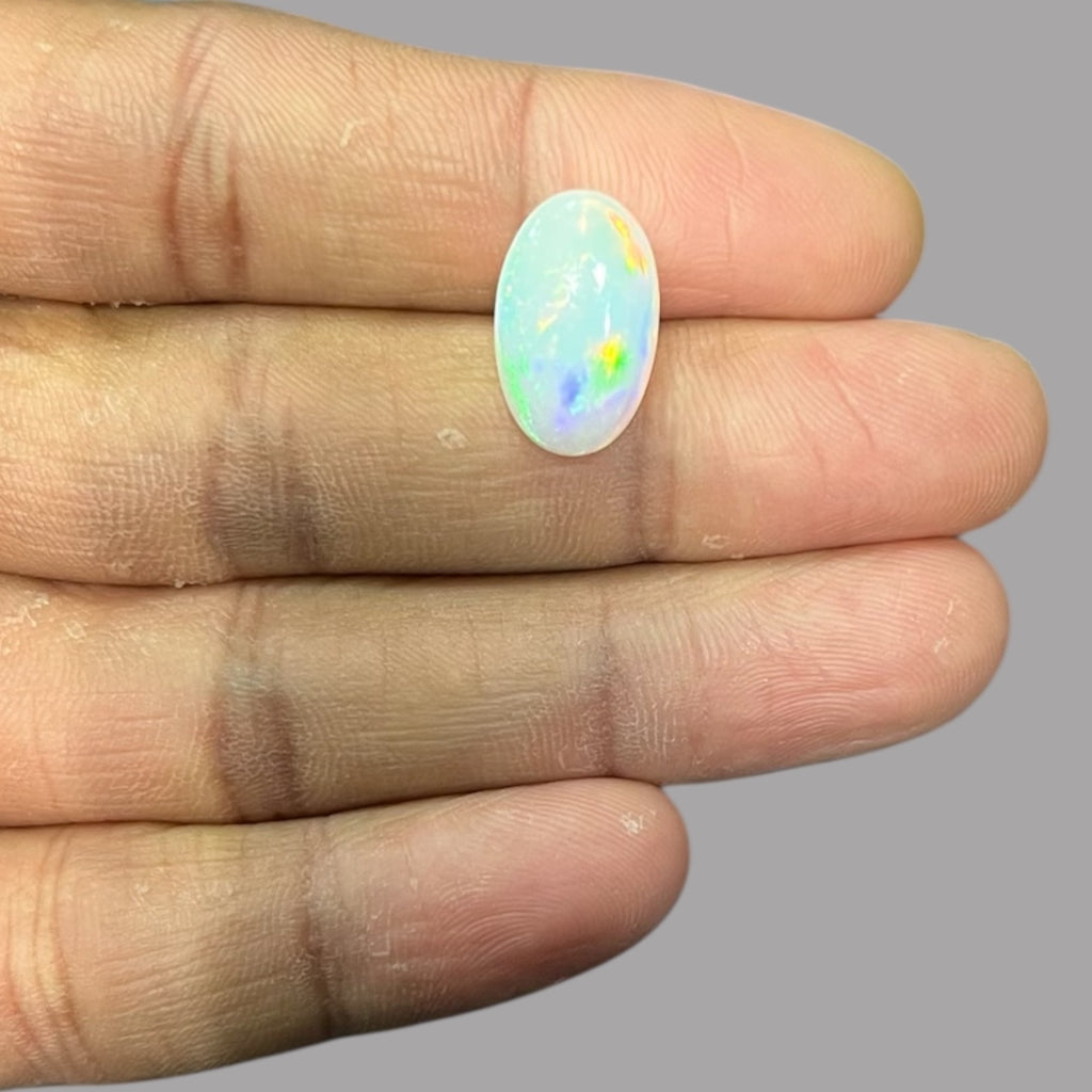 Natural Black Ethiopian Opal Stone 4.39 Carats Oval Cabochon Shape Size 16.9 x 10.5 x 5.1 mm