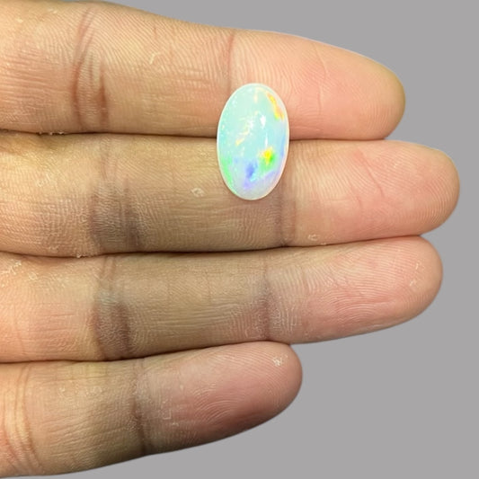 Natural Black Ethiopian Opal Stone 4.39 Carats Oval Cabochon Shape Size 16.9 x 10.5 x 5.1 mm