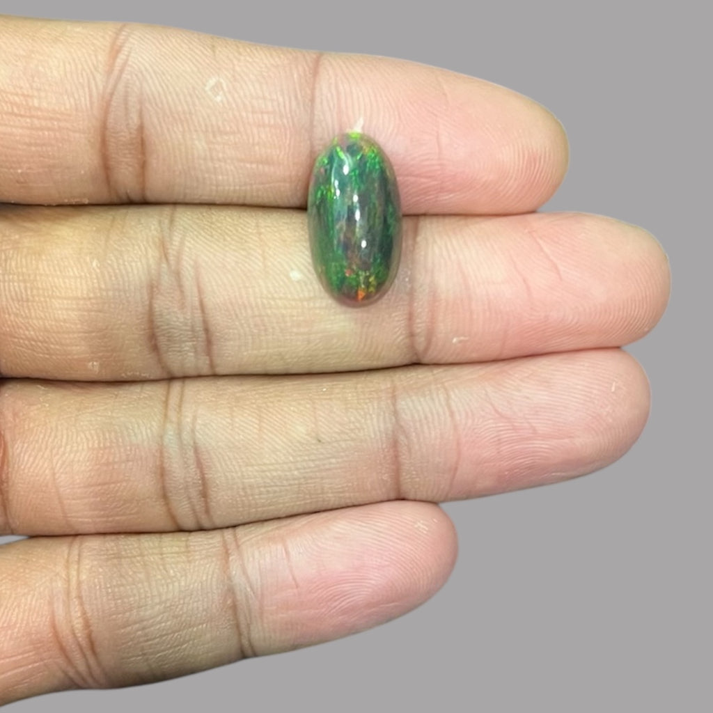 Natural Black Ethiopian Opal Stone 4.43 Carats Oval Cabochon Shape Size 18.3 x 9.9 x 5.3 mm