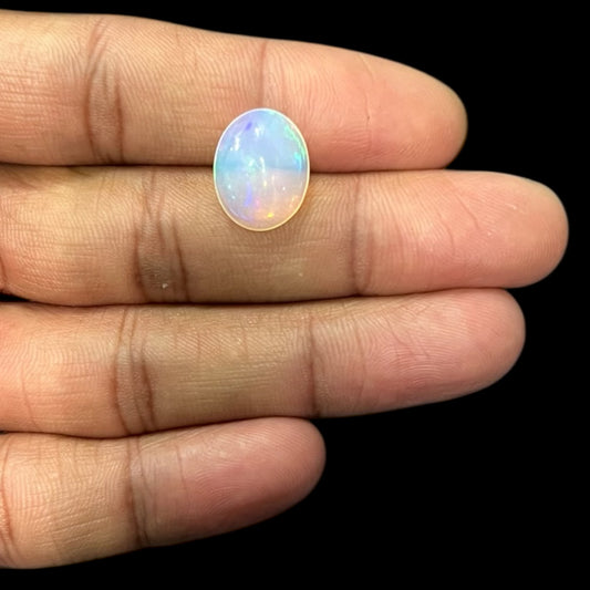 Natural Black Ethiopian Opal Stone 4.44 Carats Oval Cabochon Shape Size 15.4 x 12.2 x 5.9 mm