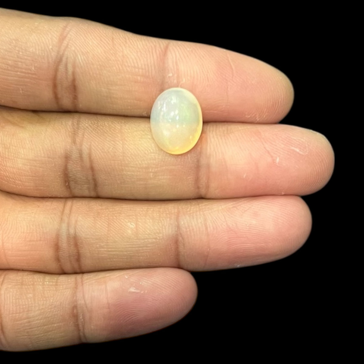 Natural Black Ethiopian Opal Stone 4.47 Carats Oval Cabochon Shape Size 13.5 x 10.8 x 7.3 mm