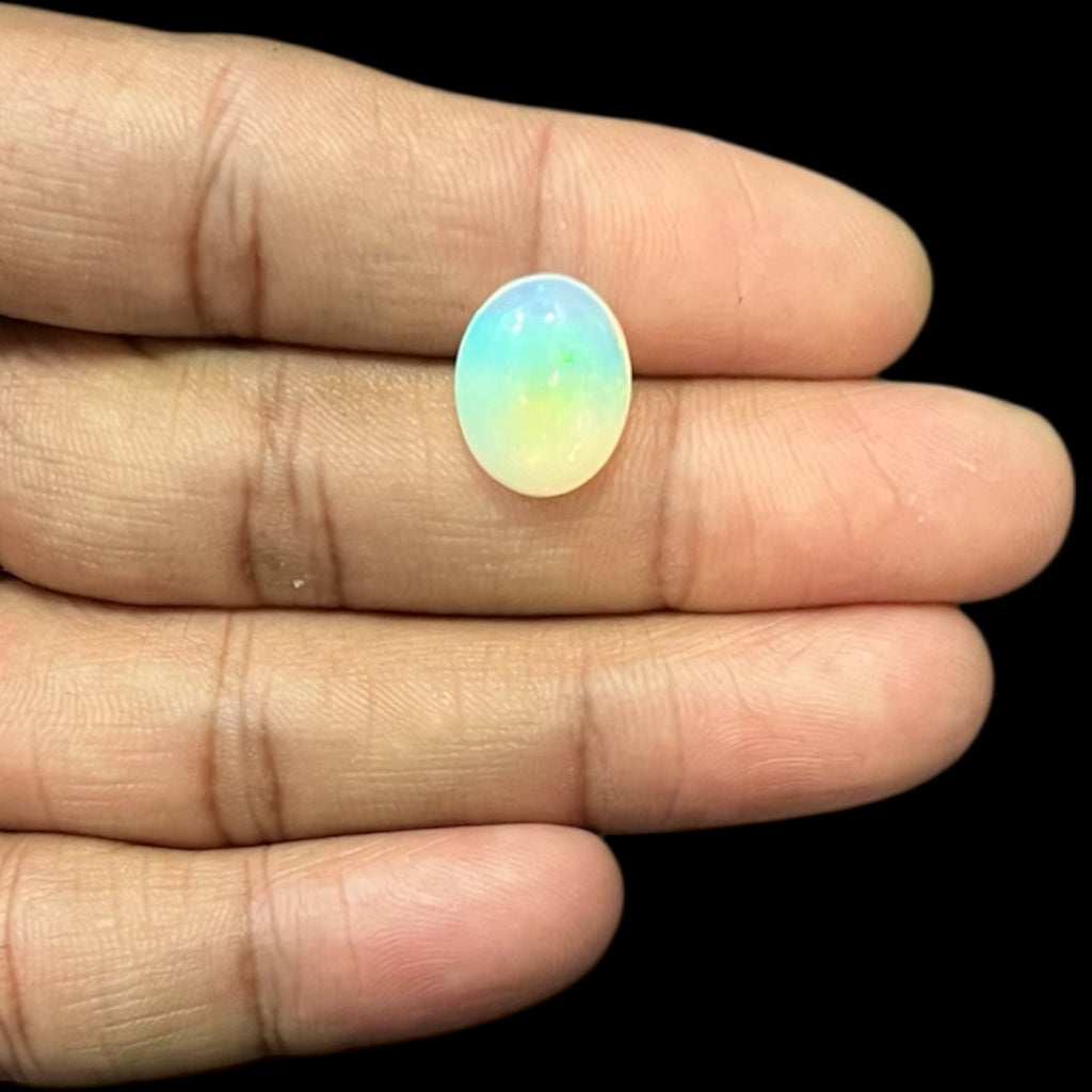 Natural Black Ethiopian Opal Stone 4.84 Carats Oval Cabochon Shape Size 14.5 x 11.6 x 5.9 mm