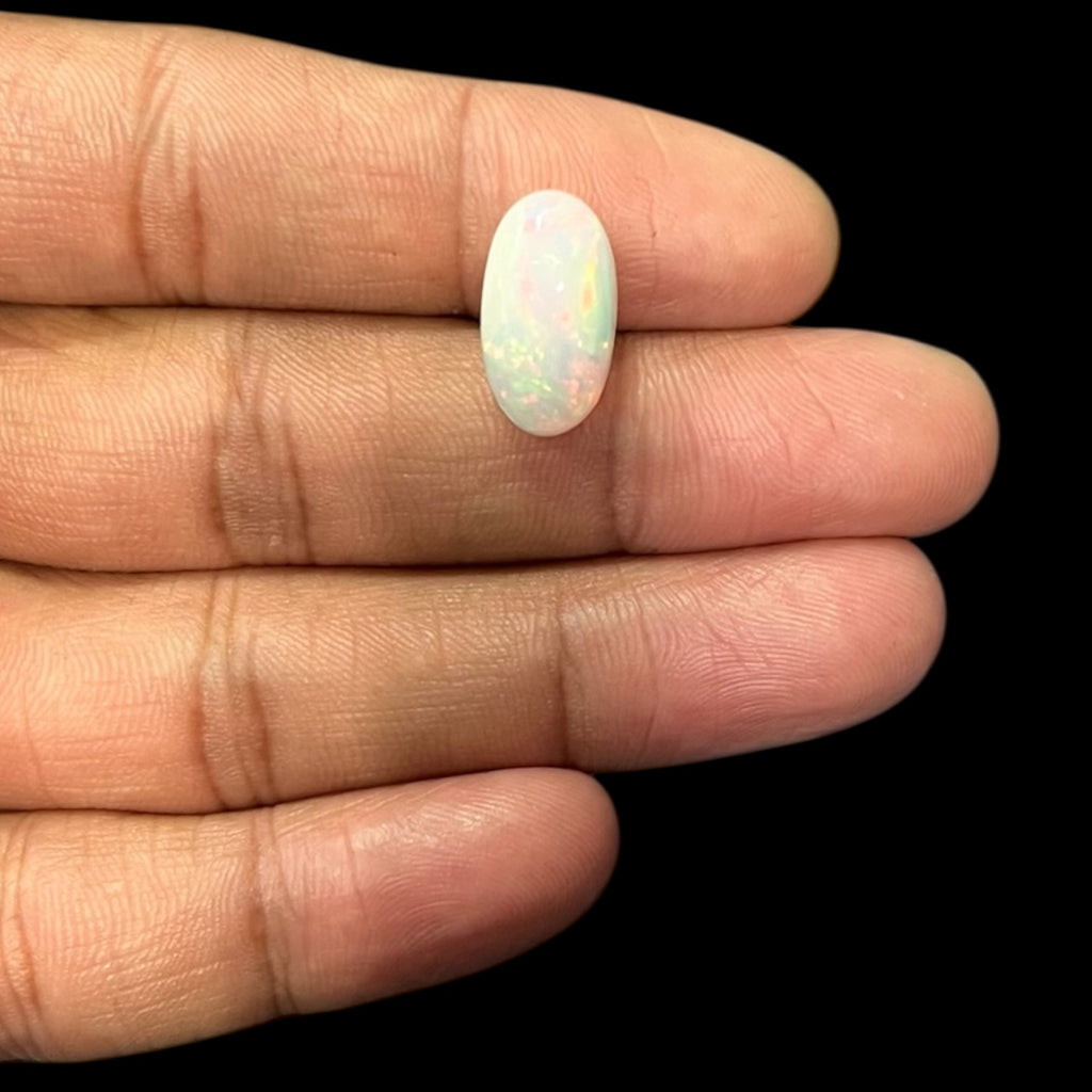 Natural Black Ethiopian Opal Stone 4.93 Carats Oval Cabochon Shape Size 16.9 x 9.3 x 6.2 mm