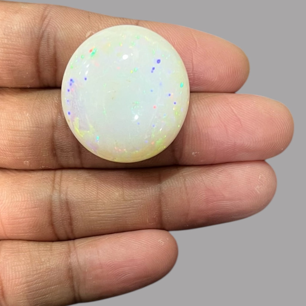 Natural Black Ethiopian Opal Stone 45.99 Carats Oval Cabochon Shape Size 30.5 x 28.5 x 11.5 mm