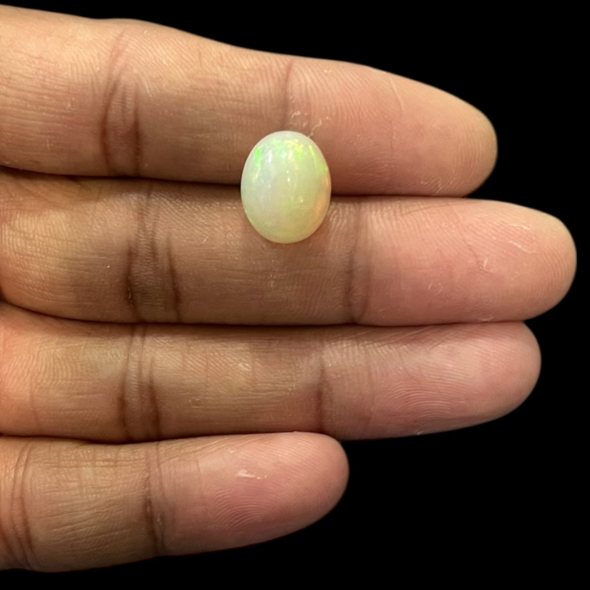Natural Black Ethiopian Opal Stone 6.01 Carats Oval Cabochon Shape Size 13.8 x 11 x 9.1 mm