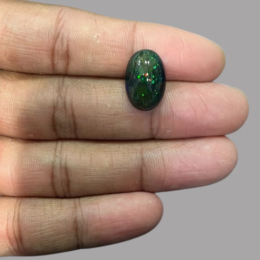 Natural Black Ethiopian Opal Stone 6.36 Carats Oval Cabochon Shape Size 17 x 11.5 x 6.6 mm