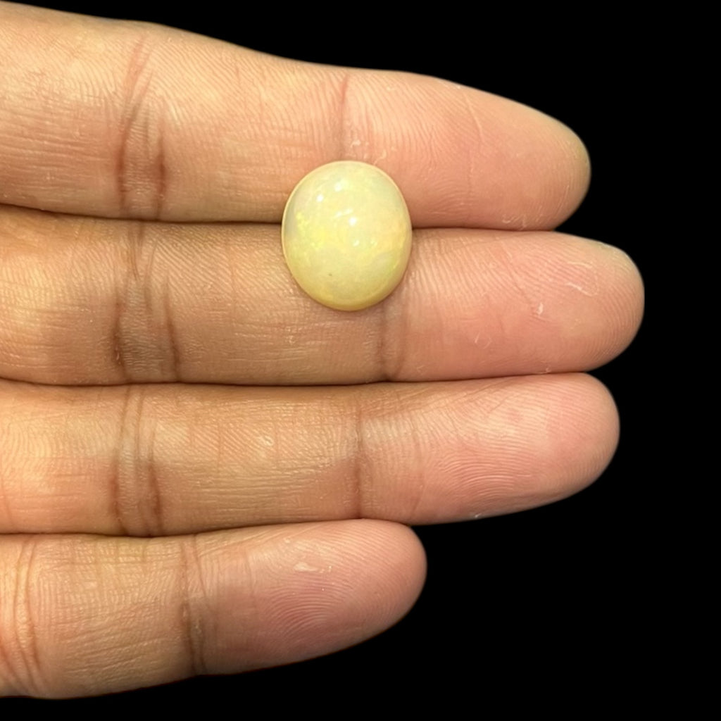 Natural Black Ethiopian Opal Stone 6.65 Carats Oval Cabochon Shape Size 15.2 x 13.3 x 7.7 mm
