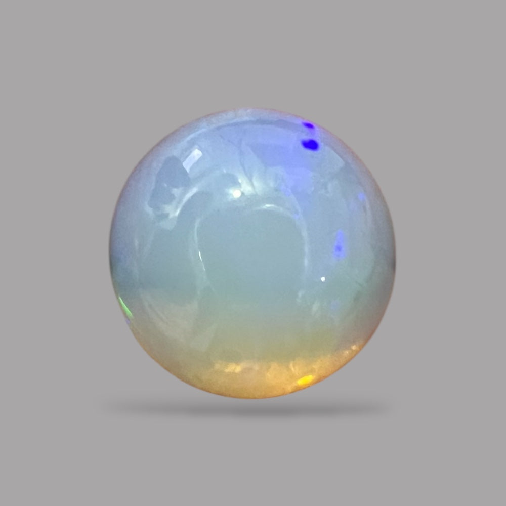 Natural Black Ethiopian Opal Stone 6.97 Carats Round Cabochon Shape Size 14.8 x 8 mm