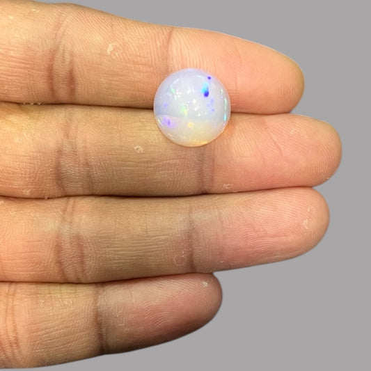 Natural Black Ethiopian Opal Stone 6.97 Carats Round Cabochon Shape Size 14.8 x 8 mm