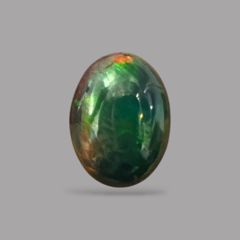 Natural Black Ethiopian Opal Stone 7.01 Carats Oval Cabochon Shape Size 16.4 x 12.2 x 7 mm 