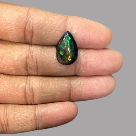  Natural Black Ethiopian Opal Stone 7.27 Carats Pear Cabochon Shape Size 19 x 12.5 x 6.8 mm