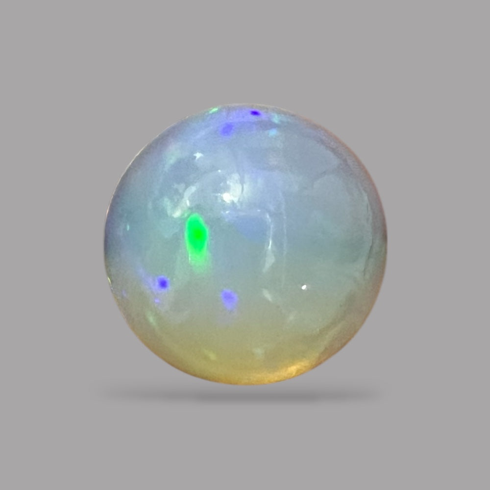 Natural Black Ethiopian Opal Stone 7.87 Carats Round Cabochon Shape Size 14.6 x 8.6 mm