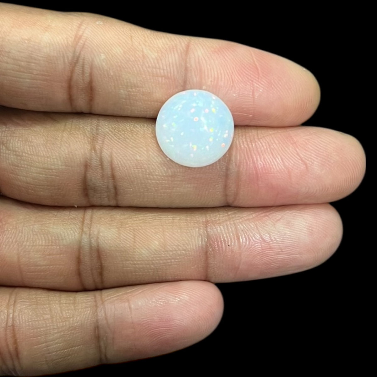 Natural Black Ethiopian Opal Stone 8.58 Carats Round Cabochon Shape Size 15 x 7 mm