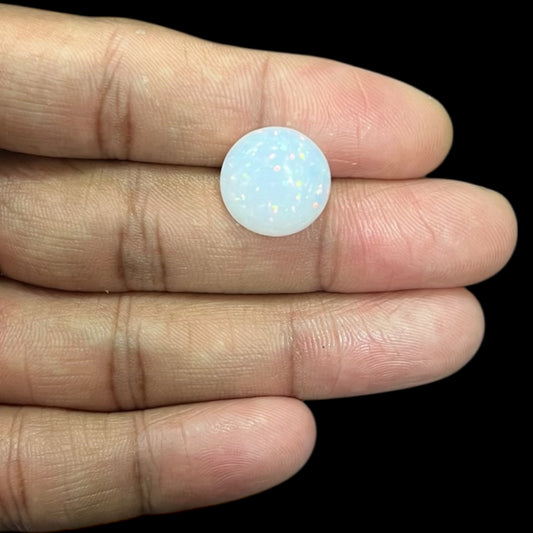 Natural Black Ethiopian Opal Stone 8.58 Carats Round Cabochon Shape Size 15 x 7 mm