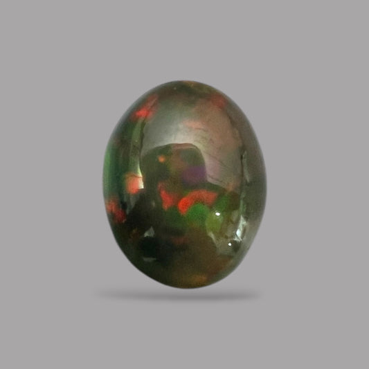 Natural Black Ethiopian Opal Stone 9.01 Carats Oval Cabochon Shape Size 17.3 x 13.9 x 8.4 mm 
