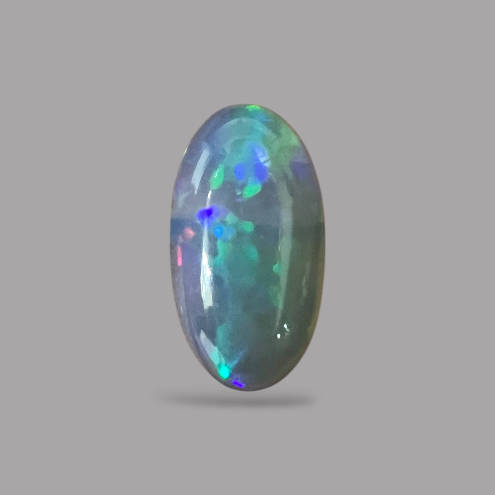 Natural Black Ethiopian Opal Stone 9.06 Carats Oval Cabochon Shape Size 20.3 x 11 x 7.4 mm