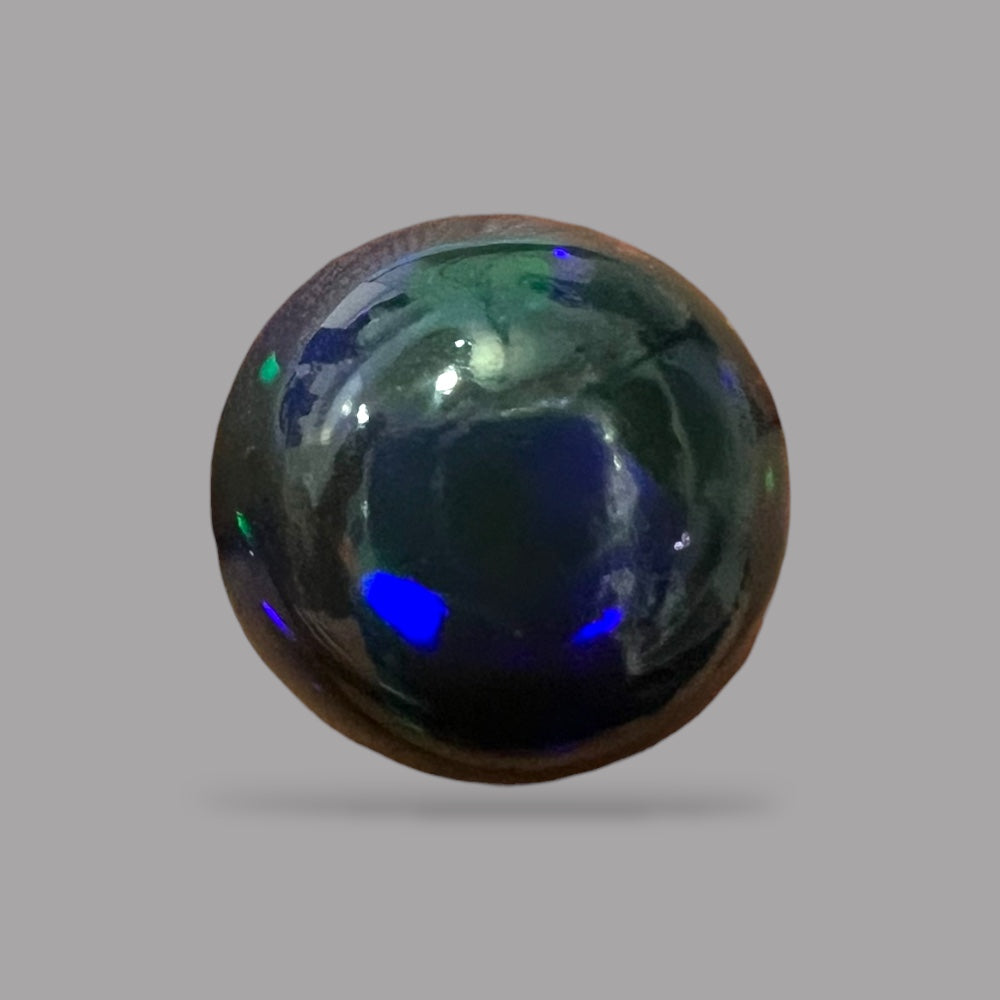 Natural Black Ethiopian Opal Stone 9.49 Carats Round Cabochon Shape Size 15.5 x 9 mm