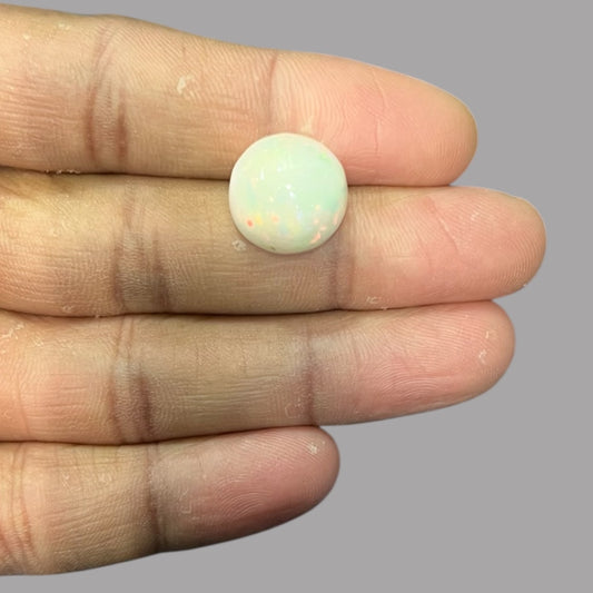 Natural Black Ethiopian Opal Stone 9.56 Carats Round Cabochon Shape Size 15 x 8.7 mm