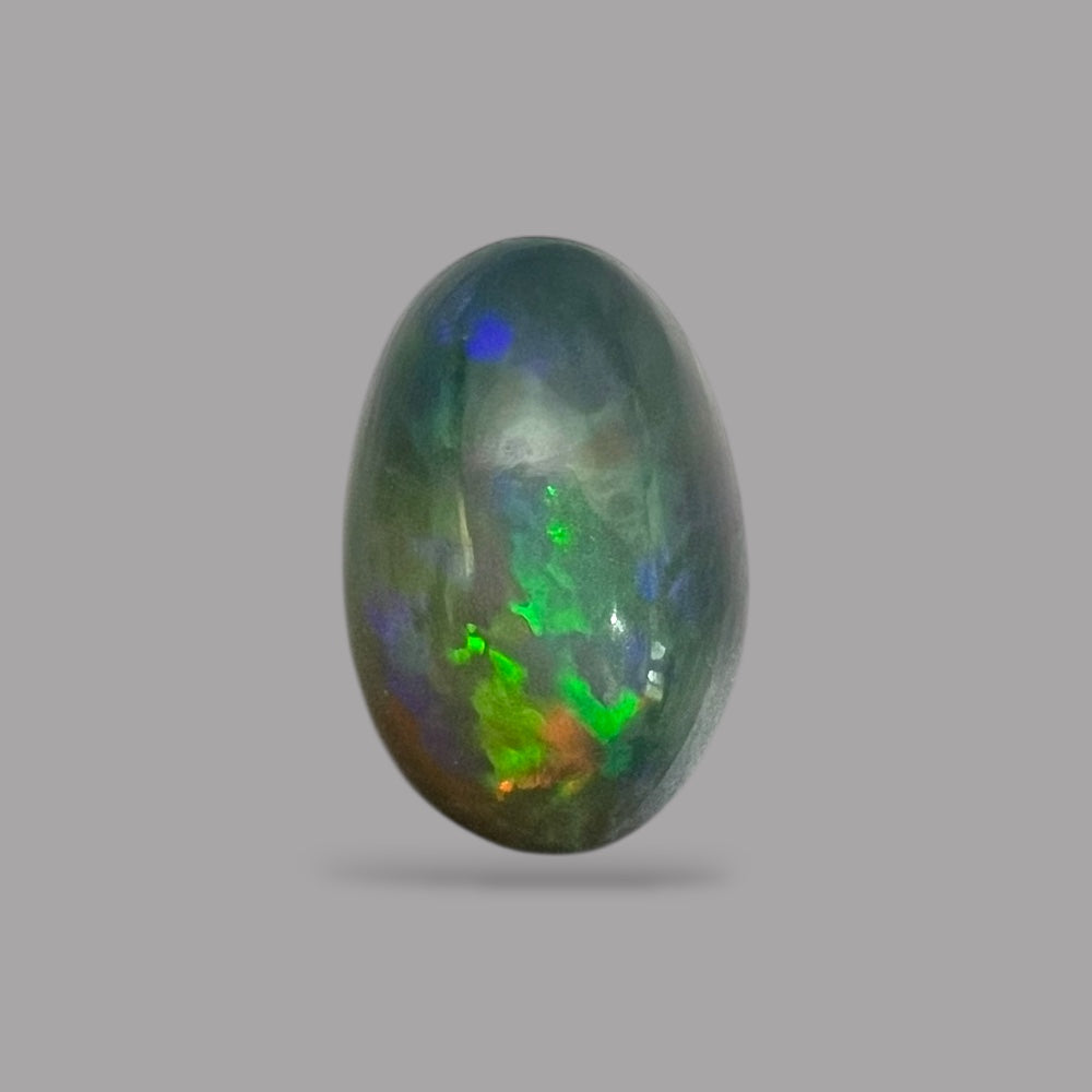Natural Black Ethiopian Opal Stone 9.61 Carats Oval Cabochon Shape Size 17.7 x 12.2 x 9.5 mm 