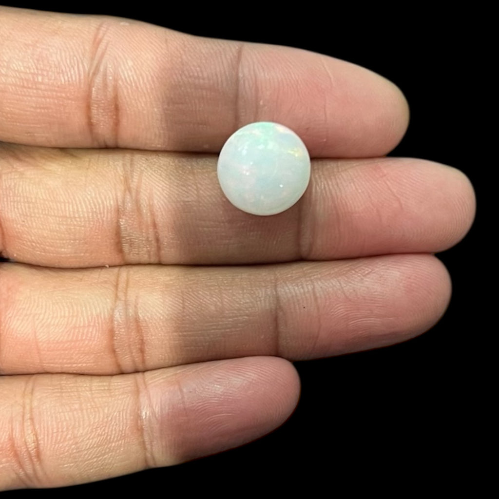 Natural Black Ethiopian Opal Stone 9.62 Carats Round Cabochon Shape Size 14 x 10.1 mm