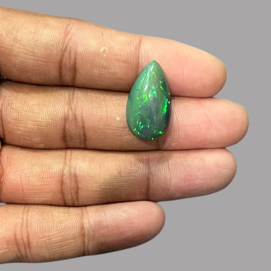 Natural Black Ethiopian Opal Stone 9.68 Carats Pear Cabochon Shape Size 23 x 13.2 x 7.9 mm