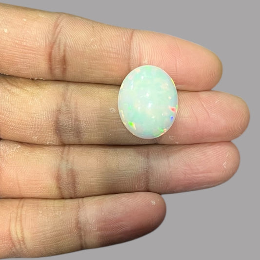 Natural Black Ethiopian Opal Stone 9.84 Carats Oval Cabochon Shape Size 20.7 x 16.9 x 6.9 mm