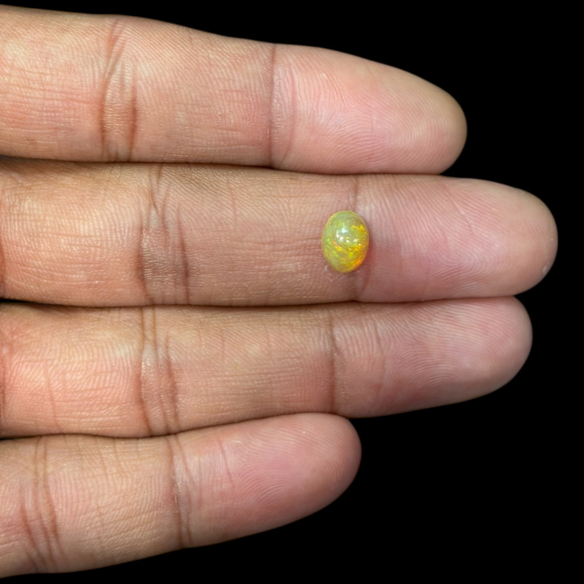 Natural DarkOrange Ethiopian Opal Stone 1.17 Carats Oval Cabochon Shape 8.1 x 6.3 mm