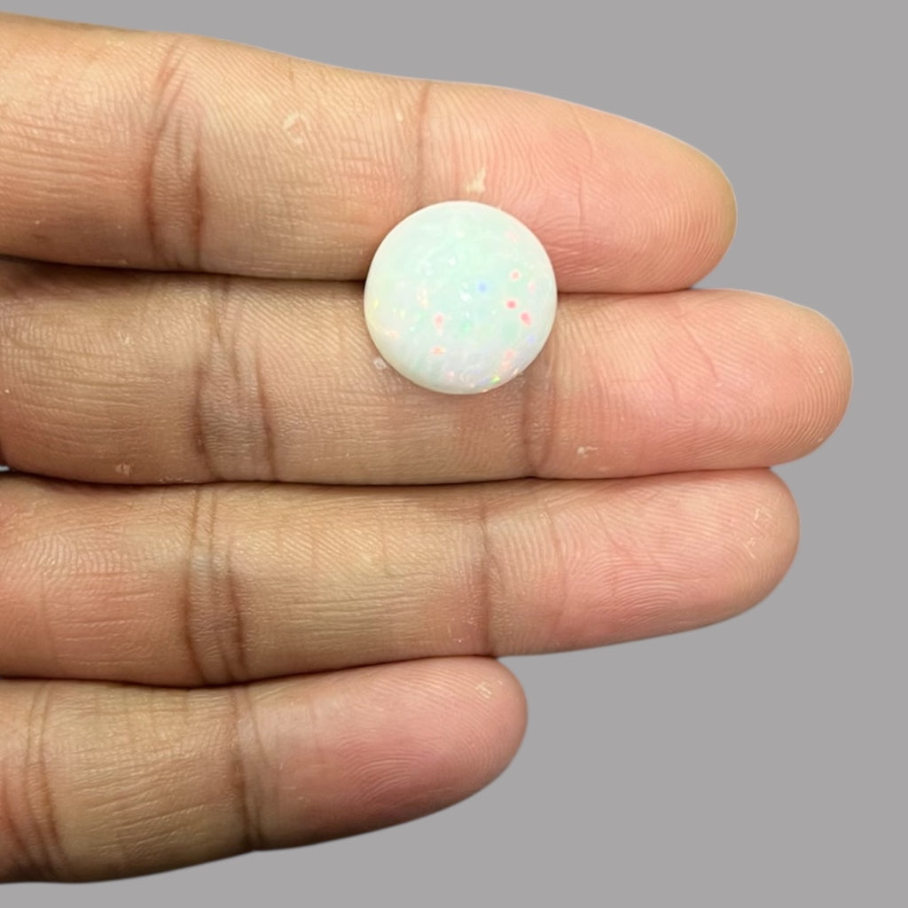 Natural Golden Color Ethiopian Opal Stone 12.28 Carats Round Cabochon Shape 15.8 x 11.3 mm