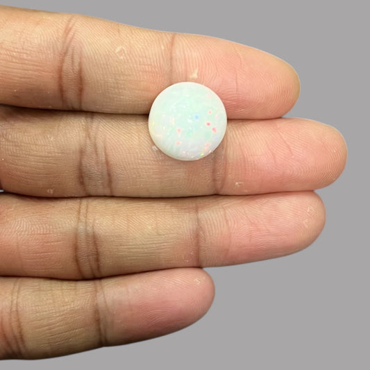 Natural Golden Color Ethiopian Opal Stone 12.28 Carats Round Cabochon Shape 15.8 x 11.3 mm