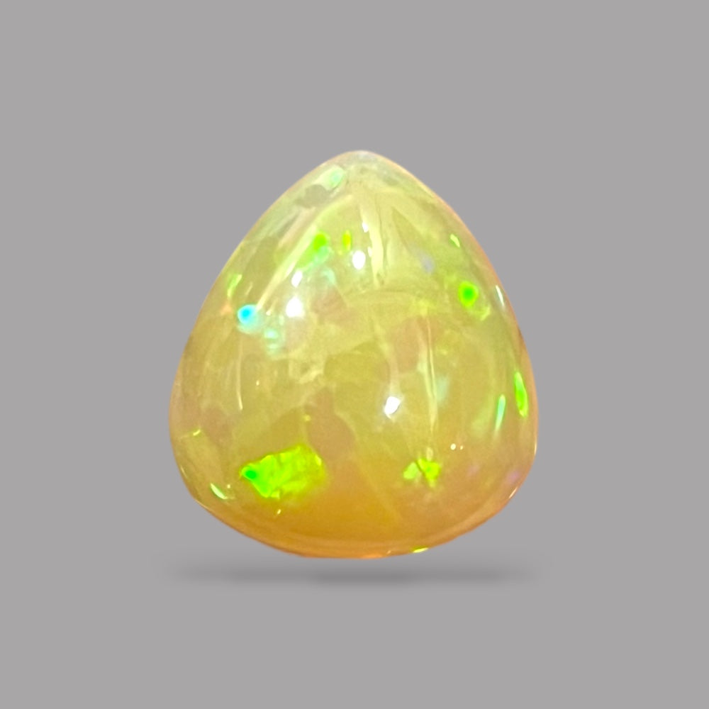 Natural Golden Ethiopian Opal Stone 19.54 Carats Pear Cabochon Shape 20.5 x 18.8 x 11.4 mm