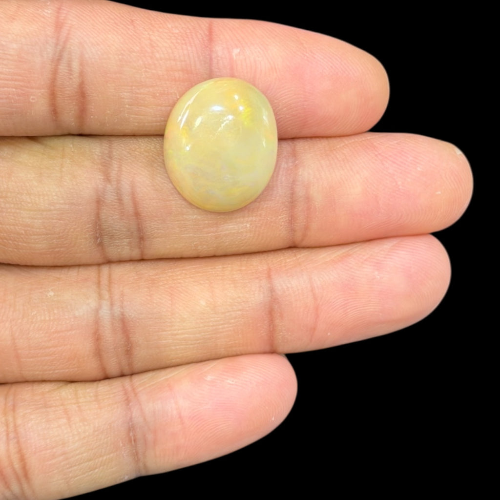 Natural Goldenrod Ethiopian Opal Stone 10.46 Carats Oval Cabochon Shape 19.2 x 16.1 x 6.5 mm