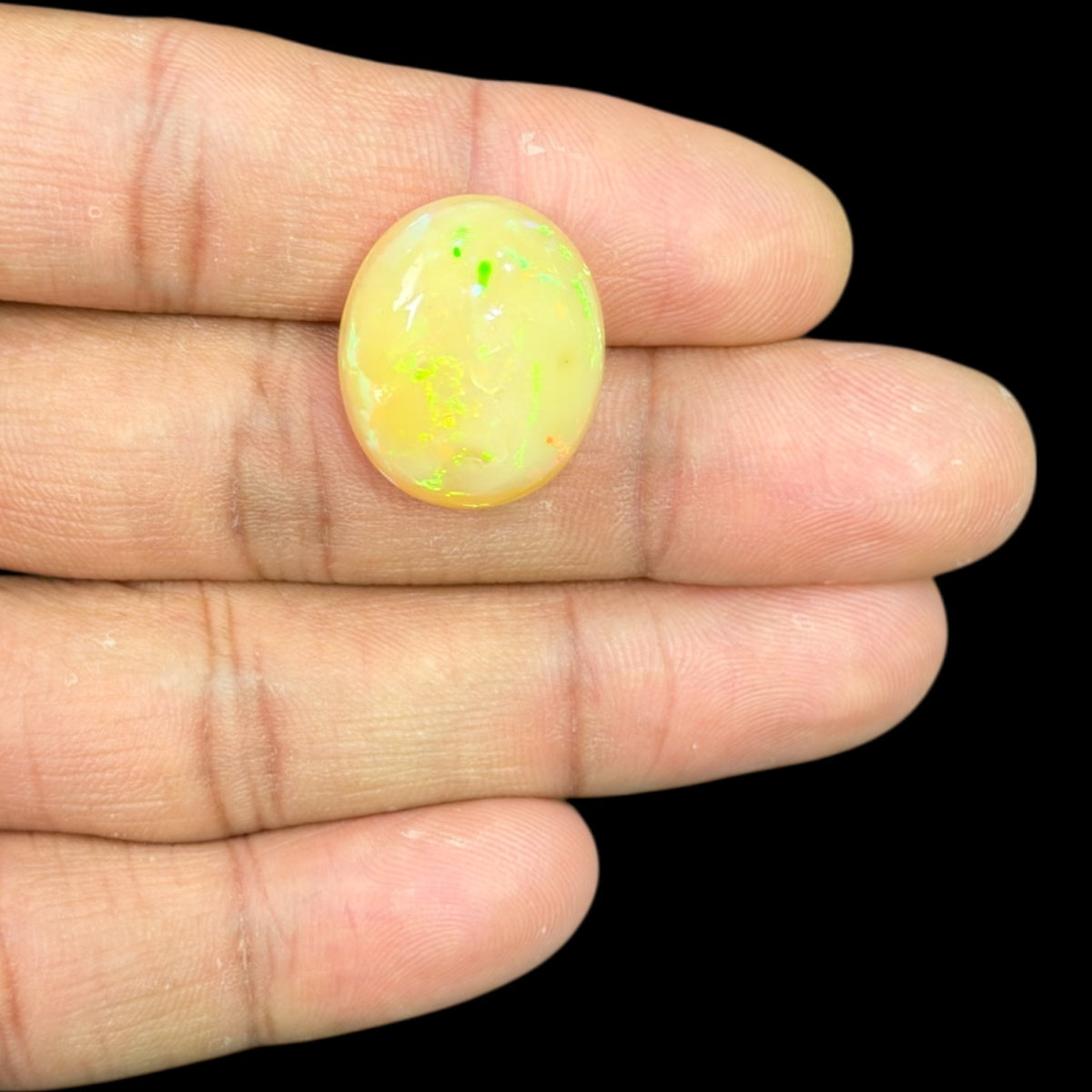 Natural Goldenrod Ethiopian Opal Stone 21.74 Carats Oval Cabochon Shape 21.2 x 17.7 x 12 mm
