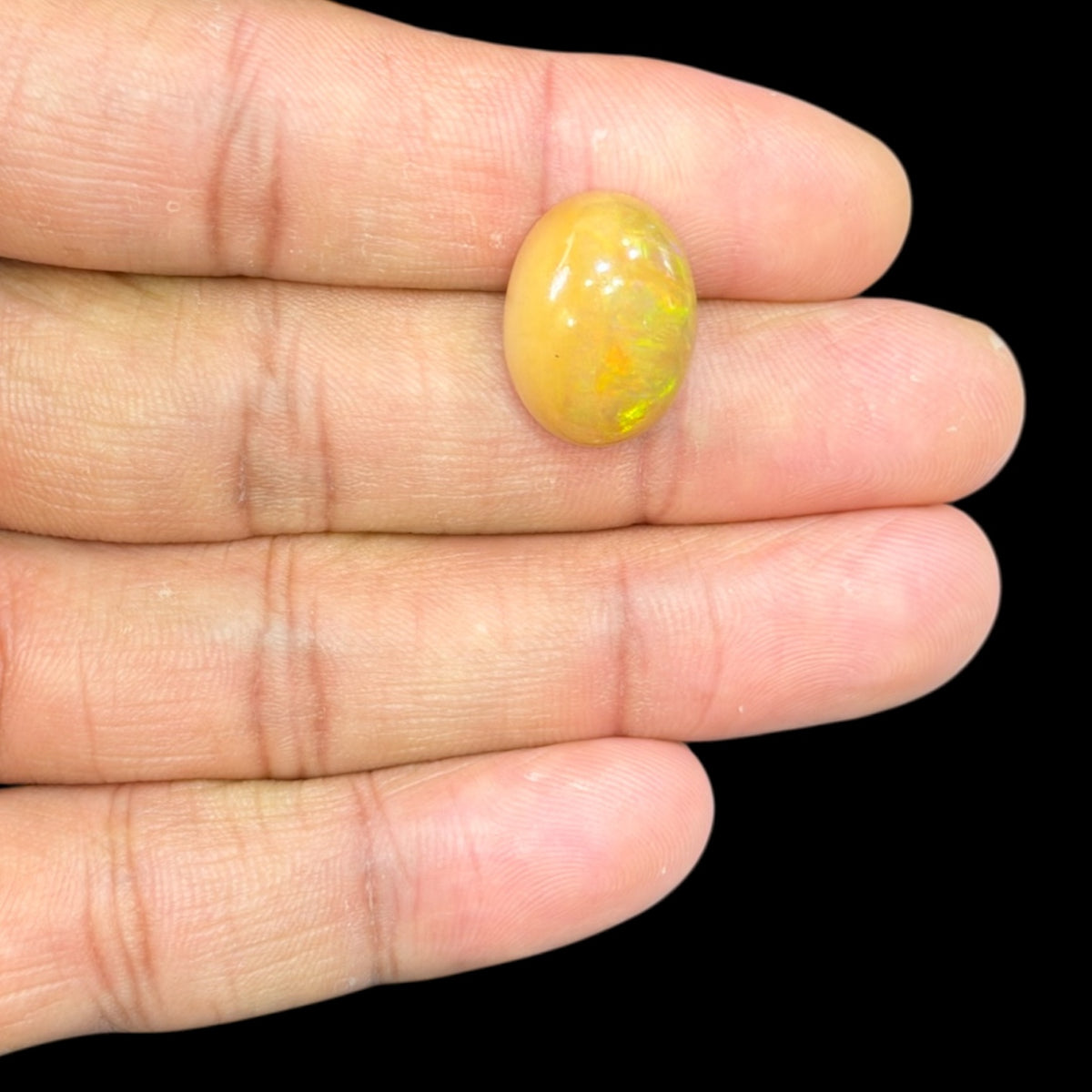 Natural Goldenrod Ethiopian Opal Stone 9.42 Carats Oval Cabochon Shape 17.3 x 13 x 8.4 mm