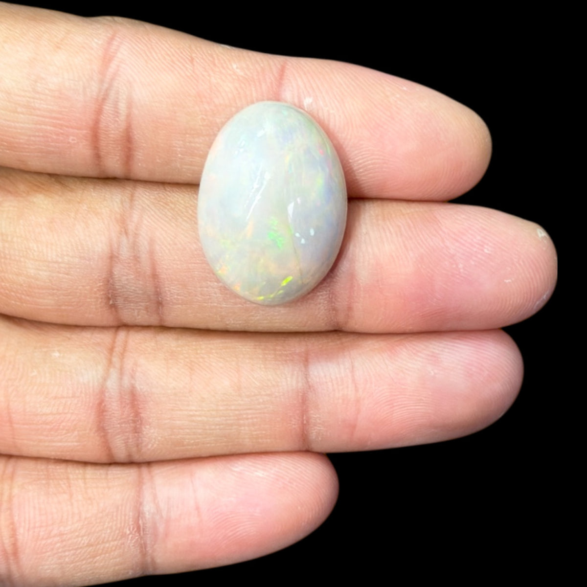 Natural Grey Ethiopian Opal Stone 23.17 Carats Oval Cabochon Shape 25.2 x 18.2 x 9.3 mm