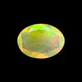 Natural LightYellow Ethiopian Opal Stone 0.61 Carats Oval Cabochon Shape 7 x 5.1 mm