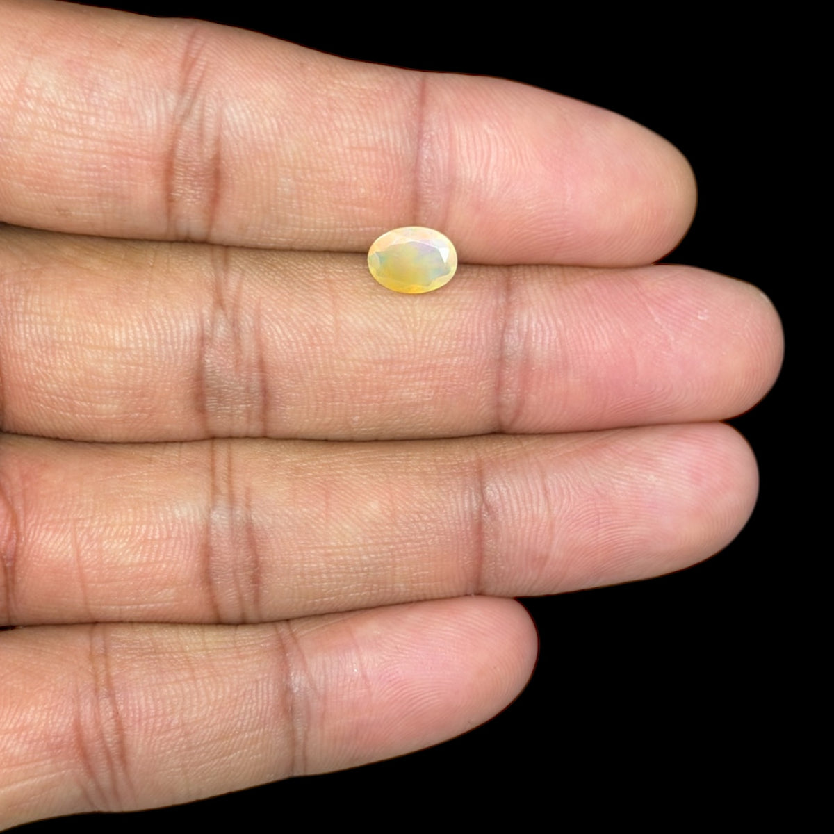 Natural LightYellow Ethiopian Opal Stone 0.78 Carats Oval Cabochon Shape 8.1 x 6 mm